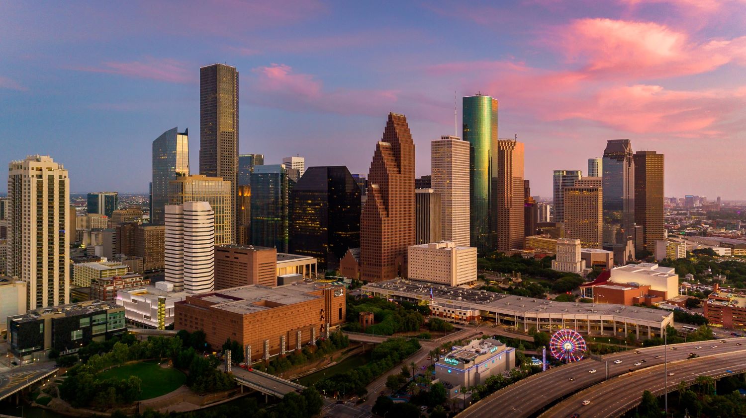 Friendly Houston SEO team reviewing website rankings and SEO performance together.